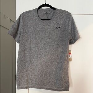 The Nike Tee women’s grey dri- fit large nwt